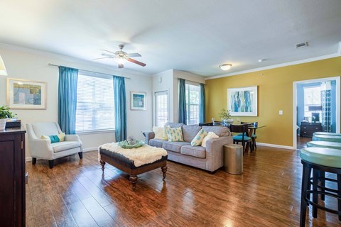 a living room with a couch and a chair